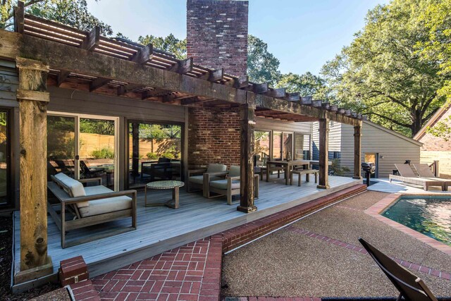 wooden terrace featuring a pergola