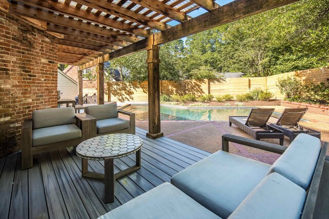 view of patio with a pergola and a pool side deck