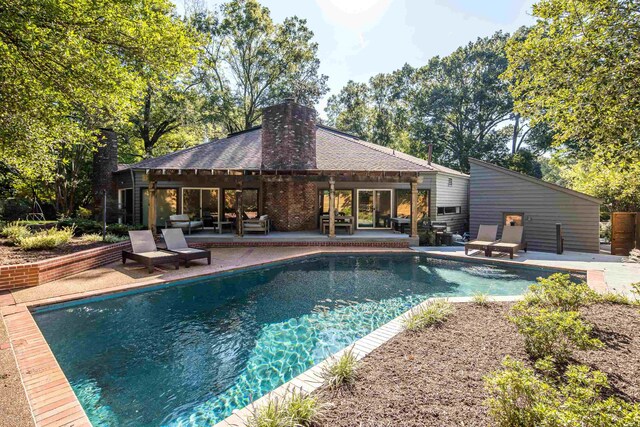 view of swimming pool featuring a patio, a gazebo, and outdoor lounge area