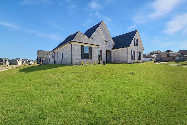 view of front of property with a front lawn