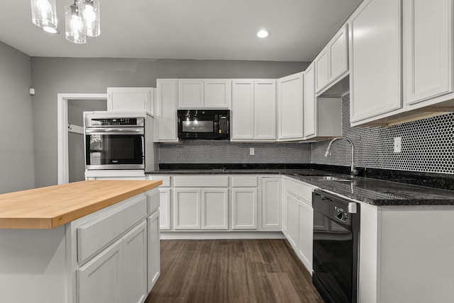 kitchen featuring black appliances, white cabinetry, dark hardwood / wood-style floors, and wood counters