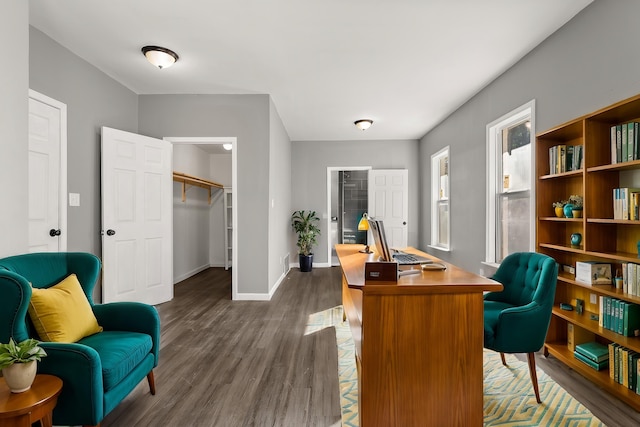 office with dark wood-type flooring