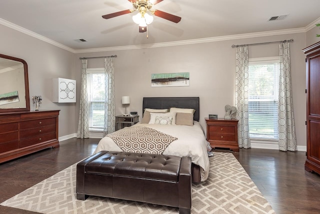 bedroom with ceiling fan, crown molding, and dark hardwood / wood-style floors