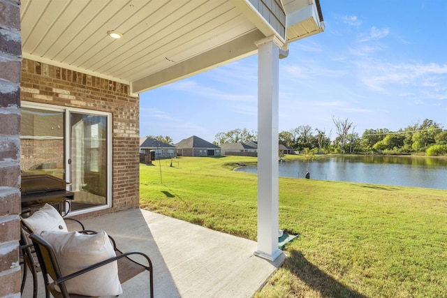 view of patio / terrace featuring a water view