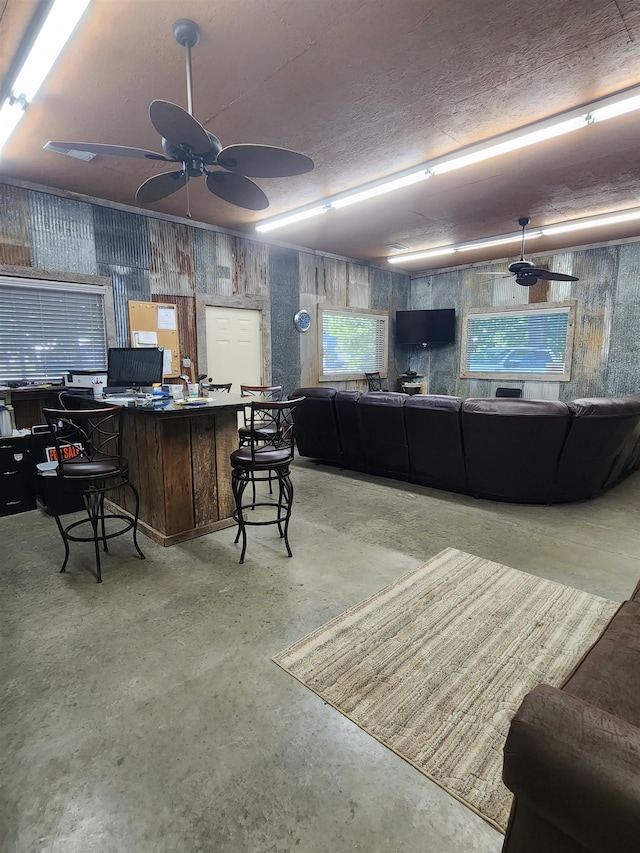 living room featuring ceiling fan