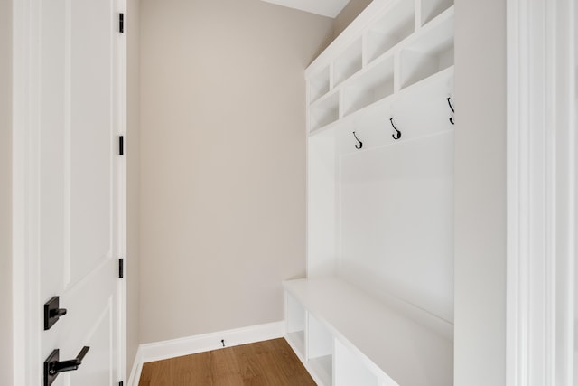 mudroom with wood-type flooring