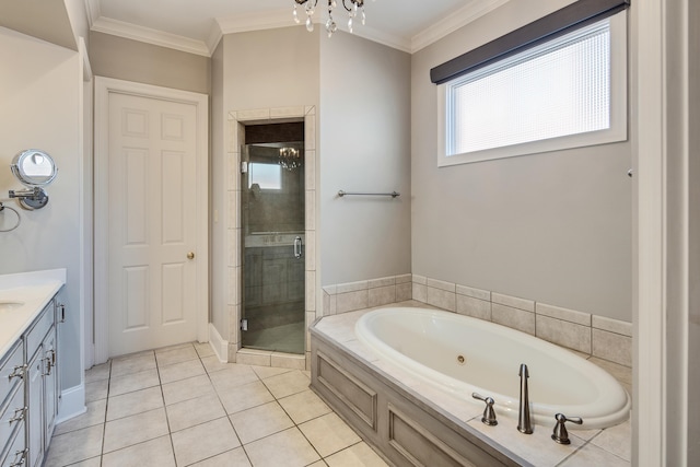 bathroom with vanity, shower with separate bathtub, ornamental molding, and tile patterned floors