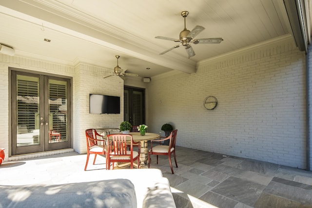 view of patio / terrace with french doors and ceiling fan