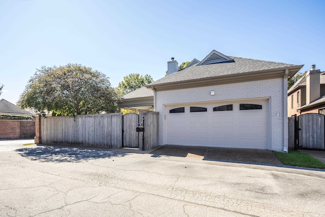 exterior space with a garage