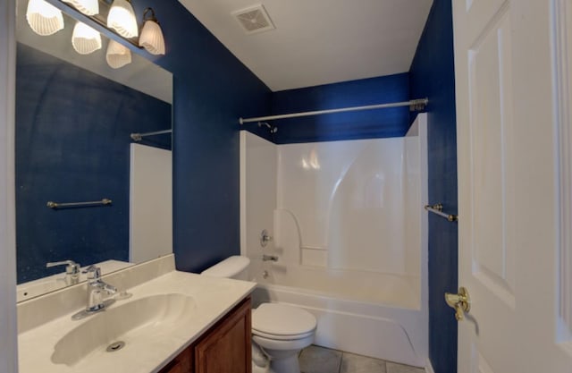 full bathroom featuring toilet, shower / washtub combination, vanity, and tile patterned floors