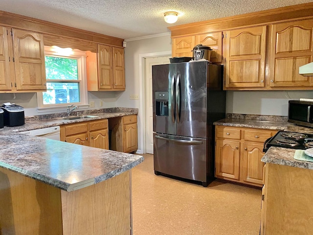 kitchen featuring stainless steel appliances, a textured ceiling, sink, and ornamental molding