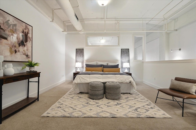 bedroom featuring light carpet