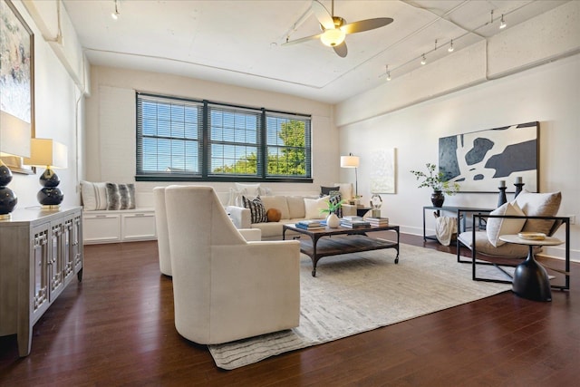 living room featuring dark hardwood / wood-style floors, ceiling fan, and rail lighting