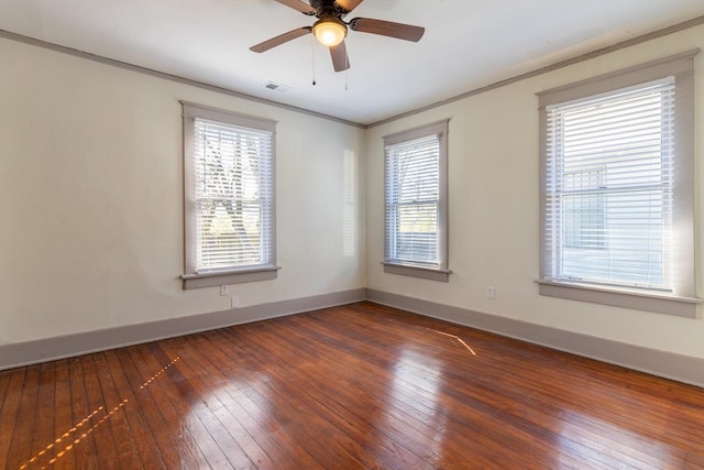 unfurnished room with ceiling fan and dark hardwood / wood-style floors