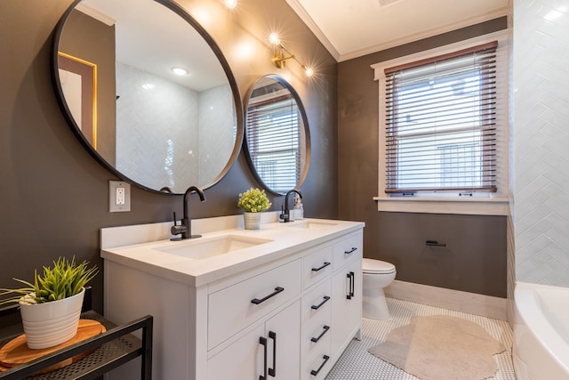 bathroom with toilet, ornamental molding, vanity, a tub to relax in, and tile patterned flooring