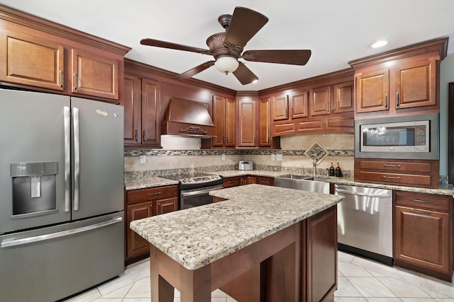 kitchen with decorative backsplash, stainless steel appliances, light tile patterned floors, custom exhaust hood, and ceiling fan