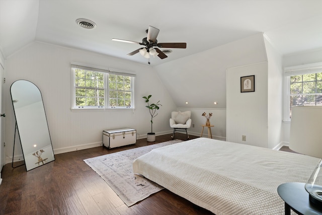 bedroom with dark wood-type flooring, ceiling fan, and lofted ceiling