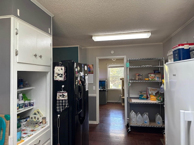 kitchen featuring a textured ceiling, black refrigerator with ice dispenser, ornamental molding, white fridge, and dark wood-type flooring