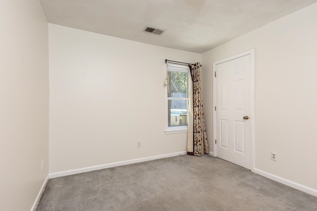 view of carpeted spare room