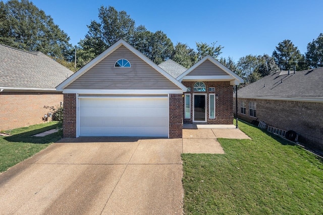 view of front facade featuring a front yard and a garage