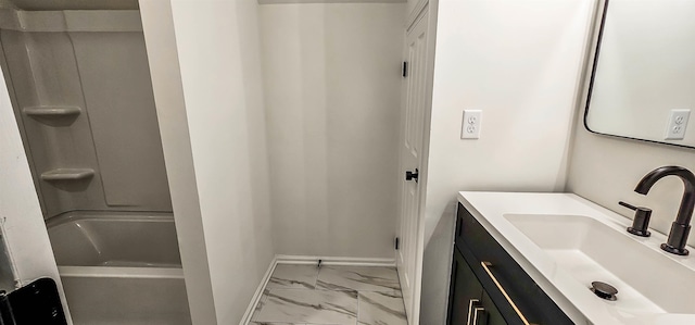 bathroom with vanity and washtub / shower combination