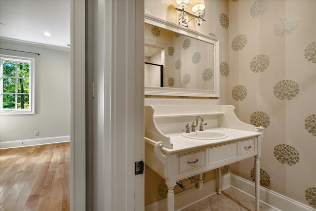 bathroom featuring vanity and hardwood / wood-style flooring