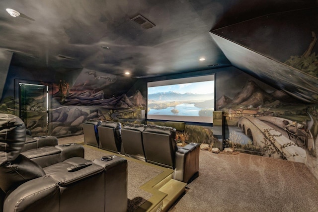 cinema room with vaulted ceiling and carpet floors