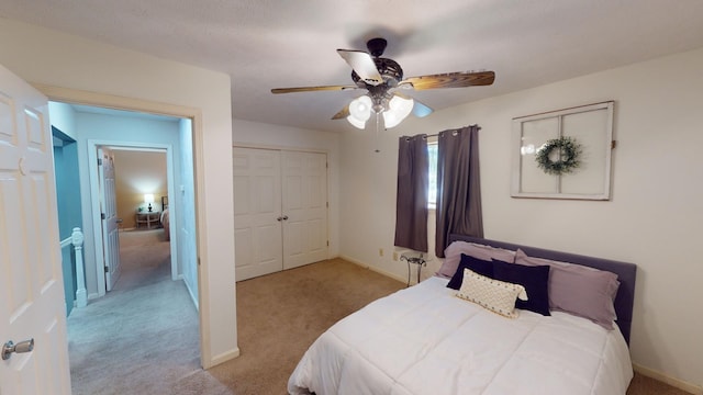 10 Rising Sun Ln, Counce, TN 38326 - bedroom featuring carpet floors, baseboards, ceiling fan, and a closet