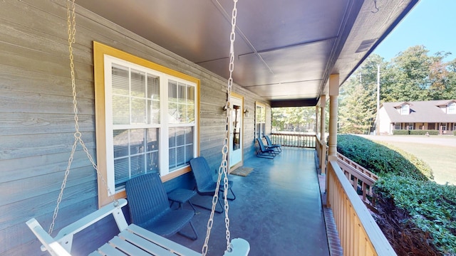 view of patio featuring covered porch