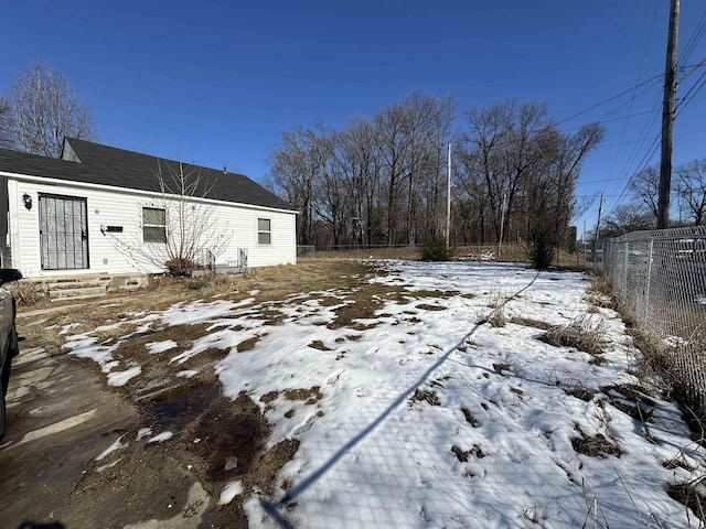 view of yard covered in snow