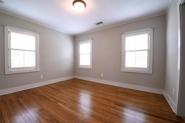 4543 Charleswood Ave, Memphis, TN 38117 - spare room with a wealth of natural light, dark wood-type flooring, and crown molding