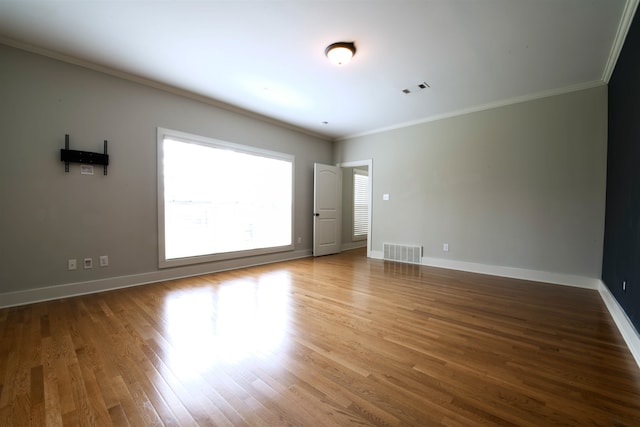 4543 Charleswood Ave, Memphis, TN 38117 - spare room featuring crown molding and hardwood / wood-style flooring