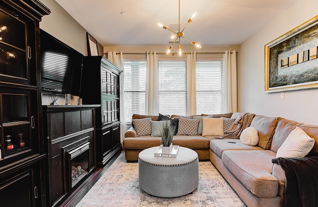 living room with an inviting chandelier