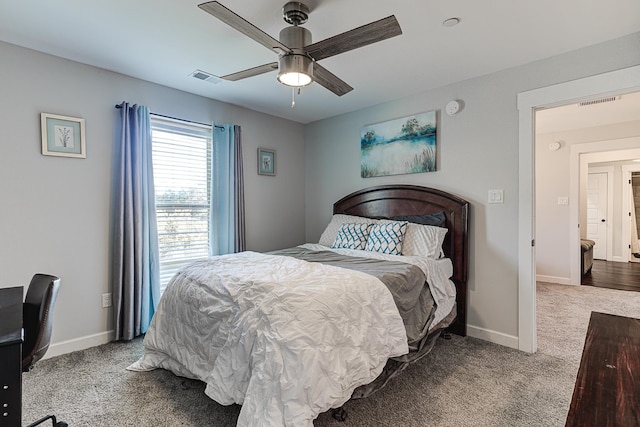 bedroom with ceiling fan and carpet floors