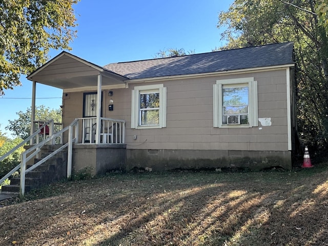 163 W Mckellar Ave, Memphis, TN 38109 - view of front of property with crawl space and a shingled roof