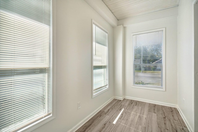 unfurnished room with light hardwood / wood-style floors