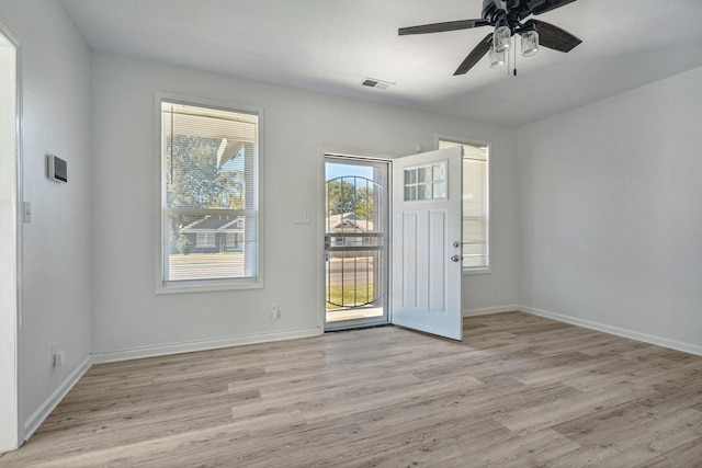 interior space featuring light hardwood / wood-style flooring and ceiling fan