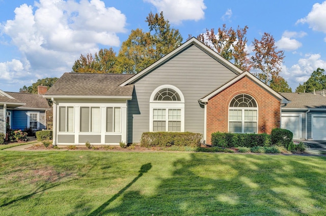 view of front of house with a front lawn