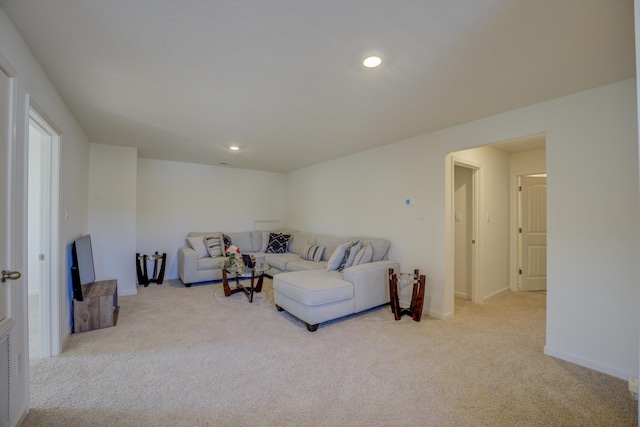 living room with light colored carpet