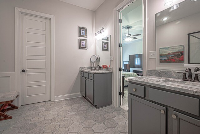 bathroom with vanity and ceiling fan