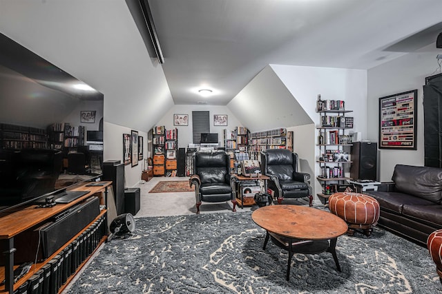 living room featuring carpet and vaulted ceiling