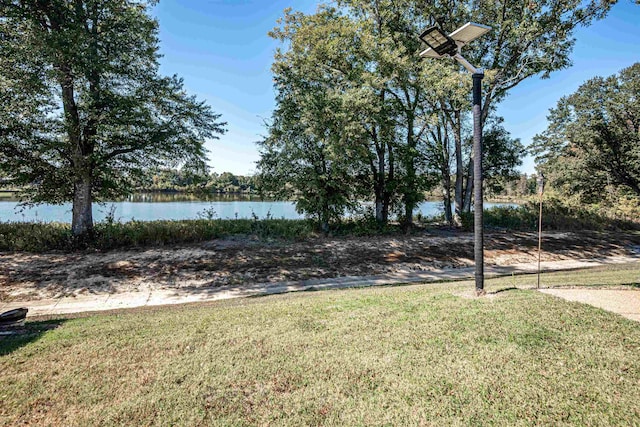 view of yard with a water view