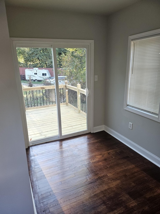 1078 N Ball Rd, Memphis, TN 38106 - empty room with baseboards and dark wood finished floors