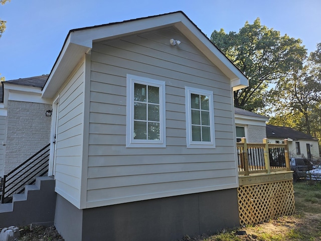 1078 N Ball Rd, Memphis, TN 38106 - view of side of home featuring a wooden deck