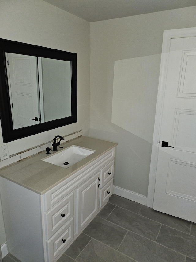 bathroom featuring vanity and tile patterned floors