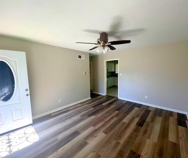 interior space featuring dark hardwood / wood-style floors and ceiling fan