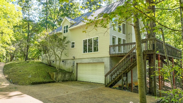 view of side of property featuring a garage