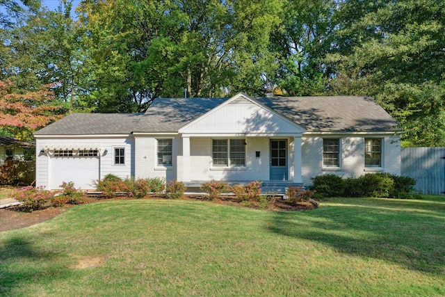 ranch-style house with a front lawn and a garage