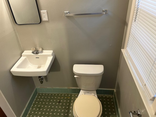 bathroom with sink and toilet