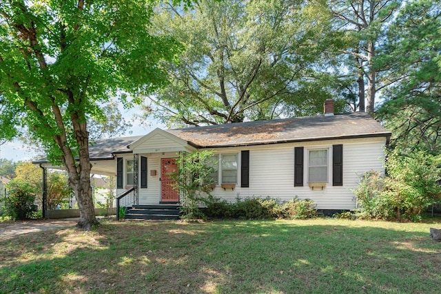 ranch-style house with a front yard